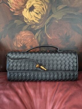 Black Leather Woven Clutch Handbag With Decorative Metal Closure. Strap Included